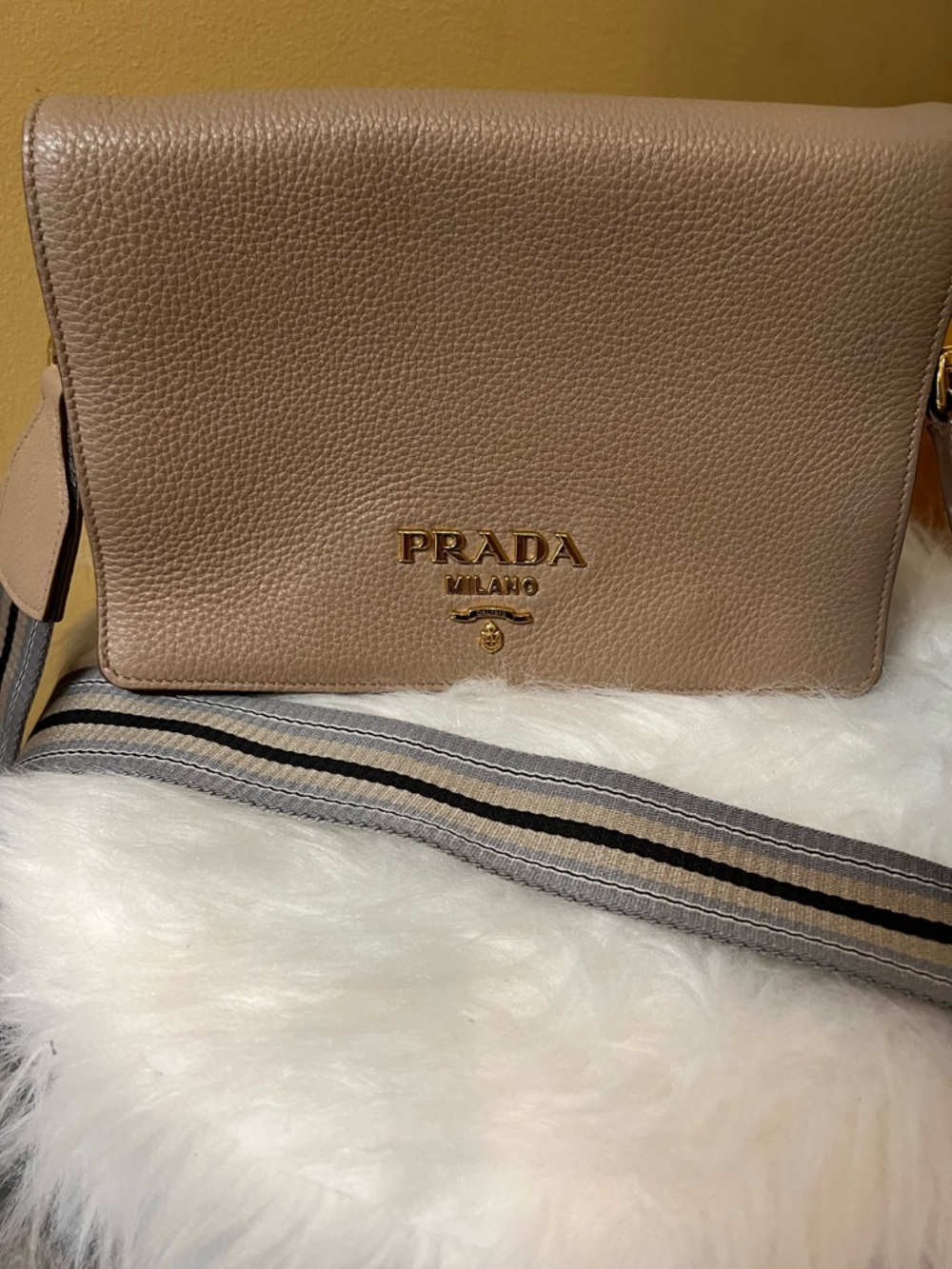 Prada Pebbled Leather Crossbody in Beige with Gold Logo